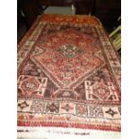An antique shiraz carpet,