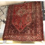 An antique Caucassian rug,