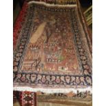 A wool and silk Qum rug, the tree of life design on camel ground,