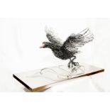 "Moorhen Rising" Inspired by a moorhen taking off from water and fabricated from steel wire on a