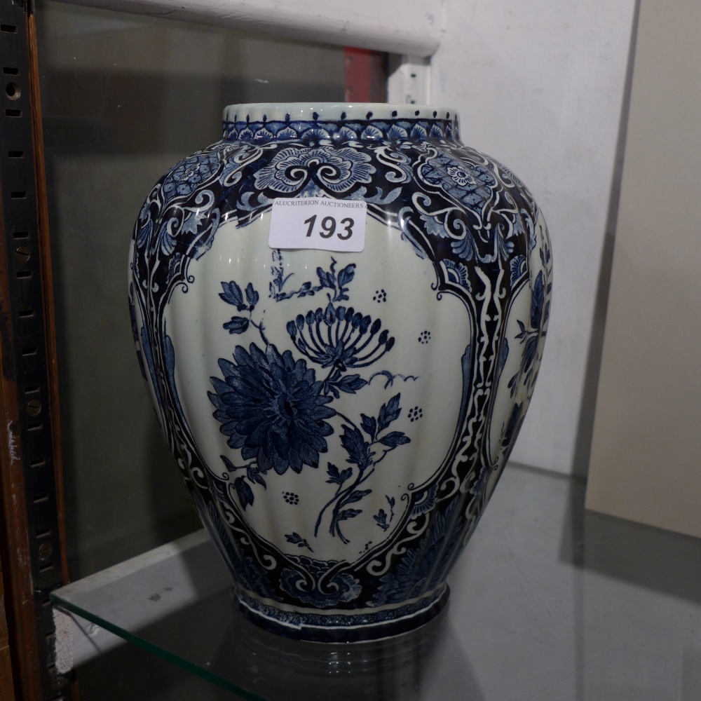 A blue and white ovoid shaped vase marked "Royal Sphinx, Mastricht, Made in Holland,
