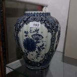 A blue and white ovoid shaped vase marked "Royal Sphinx, Mastricht, Made in Holland,