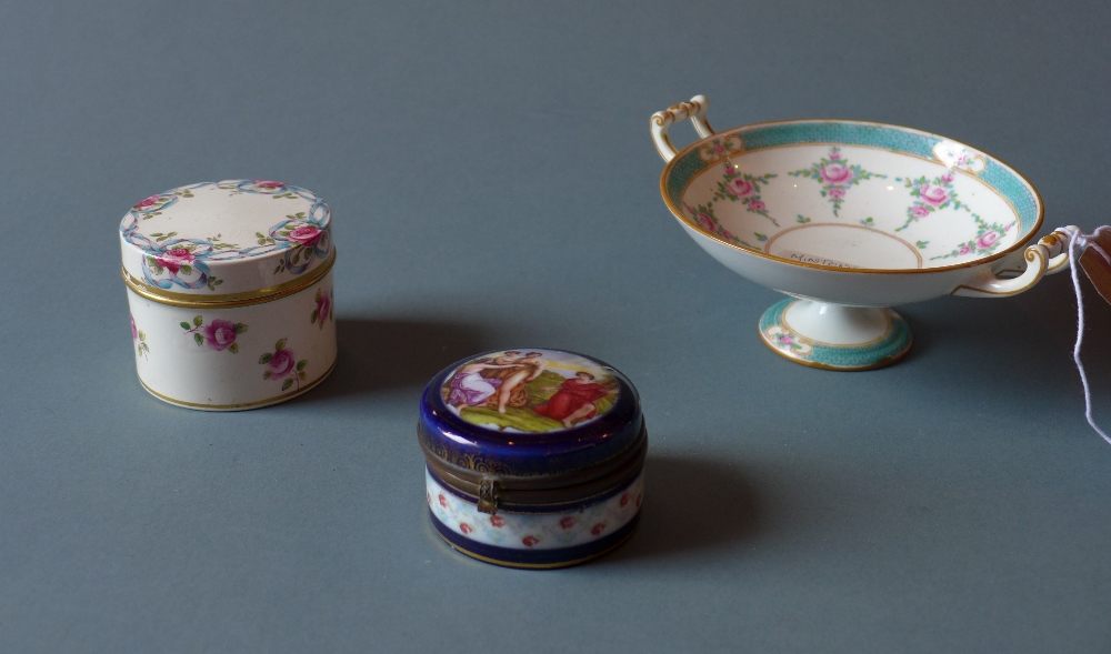 A Mintons hand painted China jar and cover decorated with roses together with a similar Mintons