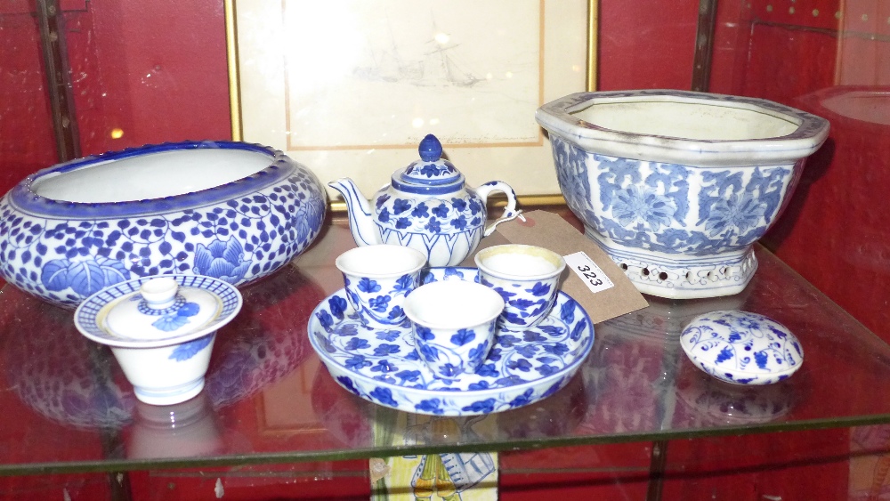 A collection of Chinese blue and white porcelain items including an ink pot,