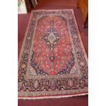 An extremely fine central Persian Kashan rug 220 cm x 125cm petal medallion with floral vines and