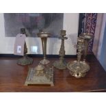 A brass inkwell together with two pair of brass candlesticks and one other