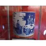 A Chinese blue and white jardiniere decorated with social scenes