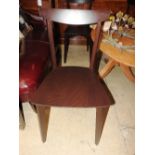 A set of four contemporary hardwood bar back dining chairs on square tapered supports (4)