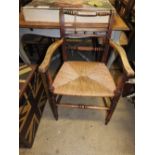 A set of five late 19th century elm country dining chairs to include one carver,