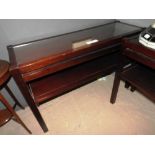 A pair of contemporary hardwood two tiered console tables,