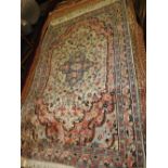 A wool and silk Kashmir carpet,