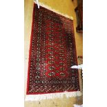 A red Turkoman rug
