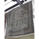 A Persian wool and silk Qum rug,