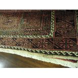 A fine North East Persian hatch lie rug, 208cm x 135cm , bearing repeating panel motifs,