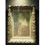 A pair of classical portraits in carved wooden frames