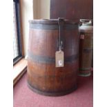 A 19th century coopered oak log bin with scrolling cast iron fittings