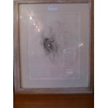 A large etching of a female face with body form by surrealist artist Hans Bellmer,