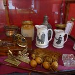 A mixed lot including a brass pestle and mortar, a pair of brass wall sconces and candle snuff,