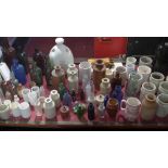 A large collection of various bottles and similar items including Victorian examples