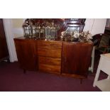 A 20th century mahogany sideboard fitted