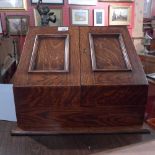 A Victorian oak stationary cabinet with