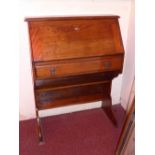 A 1940s oak students bureau with fall fr