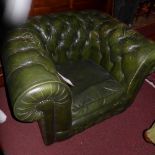 A Chesterfield armchair upholstered in g