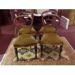 A set of four Victorian rosewood dining