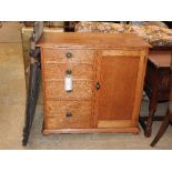 An early 20th century oak side cabinet,