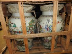 A pair of large Cantonese vases with pictoral decoration