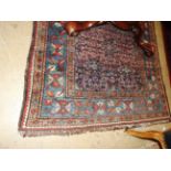 A fine antique Persian Yallameh rug, the central repeating floral design,