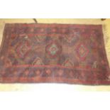 WITHDRAWN A small Afghan rug,