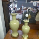 A collection of pottery vases / lamps,