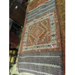 An antique Afghan Mushmai runner, the central geometric design having parallel banded ends,