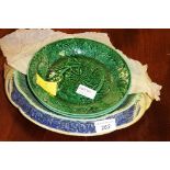 A Majolica bread plate and two Majolica leaf plates (2)