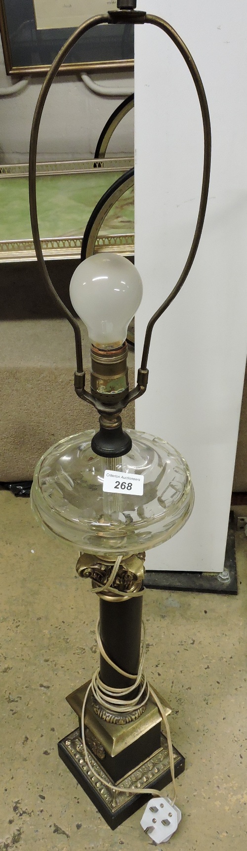 A 19th Century Corinthian column table lamp with glass reservoir