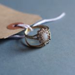 A 9ct gold an opal cluster ring together