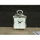 A chrome mantel clock, Franklin & Murphy