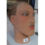A French 1920's male wax mannequin head.