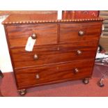 A William IV mahogany chest with beaded edge and fitted two short and two long drawers raised on