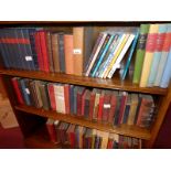 A collection of various books including some antique examples