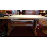 A solid pine trestle table,