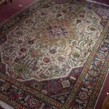 A fine north west Persian Tabriz carpet with central medallion and repeating spandrels an petal