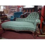 A Victorian carved mahogany chaise longue with pierced detail,