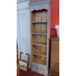 A grey painted pine open bookcase tall proportions