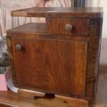 An Art Deco oak bedside cabinet with single drawer,