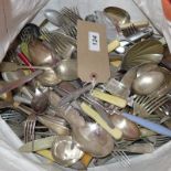 A large collection of silver plated and stainless steel flatware.