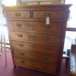 A 19th Century pitch pine chest fitted two short and five long drawers with gilt metal handles.