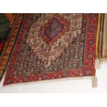 A fine antique Senneh Kilim carpet,