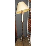 A contemporary brass standard lamp by Laura Ashley along with a pair of faux marble metal table